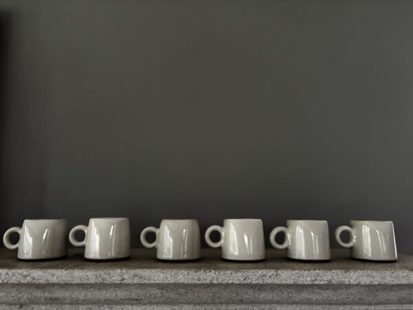 Small, white hand made white mugs