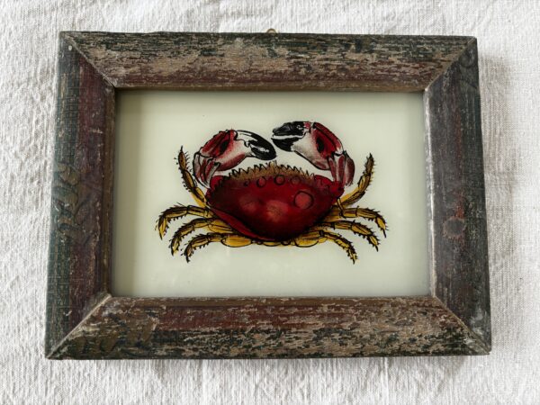 Glass painting of a crab in rustic vintage frame